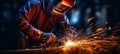 Experienced worker diligently engaged in the process of arc welding with an advanced arc welder