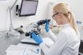 Experienced young lab assistant is doing research Royalty Free Stock Photo