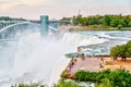 Experiencing Powerful Niagara Falls at Rainbow Bridge in New York Royalty Free Stock Photo