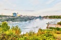 Experiencing Powerful Niagara Falls at Rainbow Bridge in New York Royalty Free Stock Photo