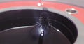 Experiment on the movement of a ferromagnetic black liquid under the action of a magnetic field. Ferrofluid takes on