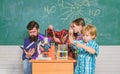 Experimenting together. Supportive environment explore STEM. Practical knowledge. Child care and development. School Royalty Free Stock Photo