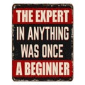 The expert in anything was once a beginner vintage rusty metal sign Royalty Free Stock Photo