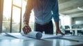 Expert Architect Reviews and Unrolls Detailed Blueprints on a Table, Generative AI