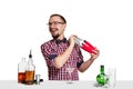 Expert barman is making cocktail at studio Royalty Free Stock Photo