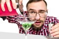 Expert barman is making cocktail at studio Royalty Free Stock Photo