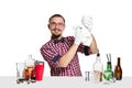 Expert barman is making cocktail at studio Royalty Free Stock Photo