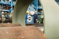 Expert checking the quality of manufactured boilers