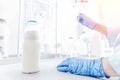 Expert control quality milk in laboratory, dairy factory industry Royalty Free Stock Photo