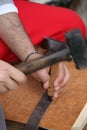 Expert craftsman working leather