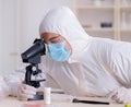 Expert criminologist working in the lab for evidence Royalty Free Stock Photo