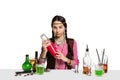 Expert female barman is making cocktail at studio Royalty Free Stock Photo