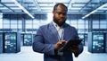 IT expert managing data center with advanced technology