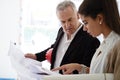 Teamwork With Boss And Assistant Looking At Plans In Building Royalty Free Stock Photo