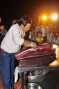 An expert is performing tuna fillet techniques at Vietnam seafood festival in Tuy Hoa city