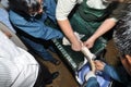 An expert is showing his techniques of collecting caviar from sturgeon fish