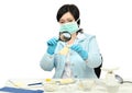 Expert viewing closely a cheese slice in laboratory