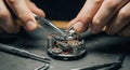 Expert watchmaker carefully assembling intricate mechanical watch movement with tools Royalty Free Stock Photo