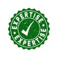 Expertise Grunge Stamp with Tick Royalty Free Stock Photo
