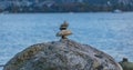 Expertly balanced stones on a Vancouver shoreline at sunset Royalty Free Stock Photo