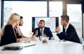 The experts in business expansion. a group of young businesspeople having a meeting in the boardroom of a modern office.