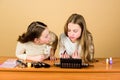 Experts in colour. Adorable small makeup artists using colour cosmetics. Cute little girls applying colour eyeshadow