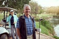 Experts in this game. Portrait of a smiling senior couple enjoying a day on the golf course. Royalty Free Stock Photo