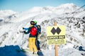 A experts only sign indicating a double black diamond run on the top of Blackcomb mountain. Royalty Free Stock Photo