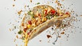 Exploded Delicious Taco with Fresh Meats and Vegetables on Light Background