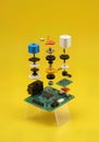 Exploded View of Electronic Circuit Board with Colorful Components, Microchips, and Hardware Parts Royalty Free Stock Photo