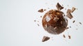 Exploding chocolate truffle with shattered pieces