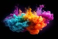 Exploding colour powder in rainbow colours on a black background Royalty Free Stock Photo