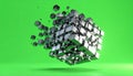 Exploding Metallic Cube on a Green Background Royalty Free Stock Photo