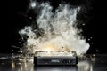 Exploding smartphone with smoke and sparks against black background Royalty Free Stock Photo