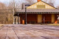 Exploration of abandon train station in the pines Royalty Free Stock Photo