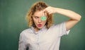 Explore chemistry. Girl observing chemical reaction chalkboard background. Woman teacher performing experiment with bulb Royalty Free Stock Photo