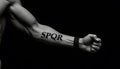 Impactful SPQR Tattoo on Gladiator Arm Royalty Free Stock Photo