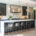 Explore this modern kitchen\'s sleek design featuring marble backsplash, dark cabinetry Royalty Free Stock Photo