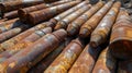 Rusty Arsenal: Pile of Weathered Artillery Shells in Abandoned Field