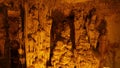 Explore speleology wonders in a cave with stalactites, stalagmites. Speleology reveals ancient, colorful underground