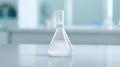 Explore the world of chemistry with a white beaker, flasks, and lab tubes, essential for scientific research and experiments Royalty Free Stock Photo
