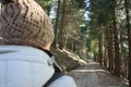 Explorer girl on an adventurous excursion in the mountains of the Tuscan-Emilian Apennines. Apuan Alps on a beautiful sunny cold