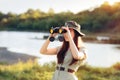 Explorer Girl with Camouflage Hat and Binoculars