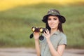 Explorer Girl with Camouflage Hat and Binoculars