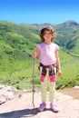 Explorer girl hicker stick high green valley Royalty Free Stock Photo