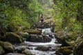 Explorer girl visiting a Mexican forest, ready for a new adventure.