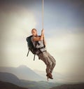 Explorer hanging from a rope Royalty Free Stock Photo