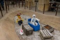 Explorer and a skeleton in the coffin made of Lego