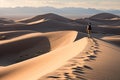 Exploring Death Valley man walking on Mesquite Flat Sand Dunes Royalty Free Stock Photo