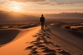 Exploring Death Valley man walking on Mesquite Flat Sand Dunes Royalty Free Stock Photo